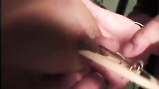 A sexy girl is tied up and beaten in a bdsm video
