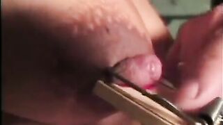 A sexy girl is tied up and beaten in a bdsm video