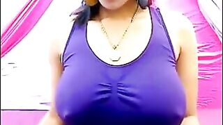 Her nipples are standing and her T-shirt is wet, she's very excited