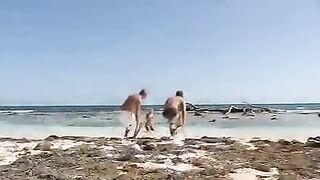 Beach threesome sex with a stunning blonde beauty in a transparent bikini