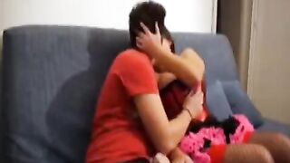 A couple shot a home porn video, getting intimate on the couch