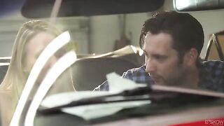 Couple engaged in passionate sex right in the red car
