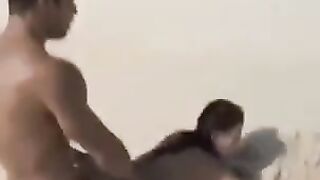 A girl with a great ass is walking naked on the beach