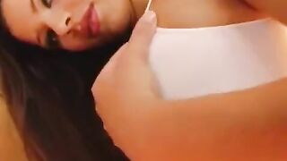 The girl plays with a dildo to achieve intense orgasm satisfaction