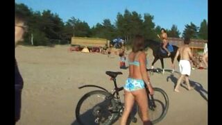 Nudist beach action with a girl and her awesome ass