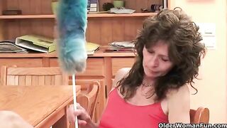 A mature woman plays with her pussy through masturbation