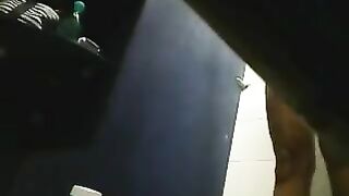 A hidden camera filmed a girl's shower and shaved pussy