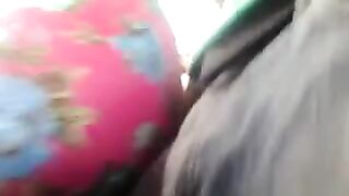 A guy masturbates on the riser while a woman is passing by