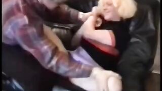 A hot chick is having fun with a motorbike, she loves riding it