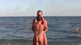 Acrobatic nudists have an intense sex on the nude beach
