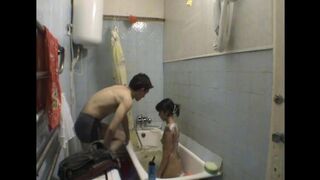 A brother is fucking his sister in the bathroom
