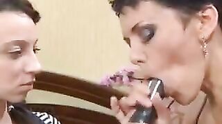 A Russian mom teaches her daughter to suck cock using a strapon
