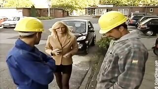Girl in black pantyhose gets a dick in her mouth on the set of porn