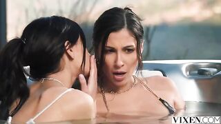 A stunning brunette beauty and her girlfriend enjoy a passionate threesome in paradise