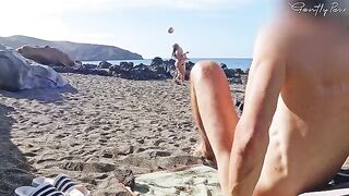 Two pretty girls got caught by a naked guy on the nude beach