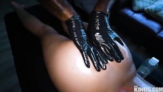 A masseur caresses and penetrates the pussy with his fingers