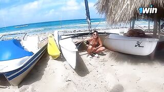 A passionate couple has a great experience on the beach