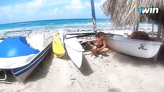 A passionate couple has a great experience on the beach