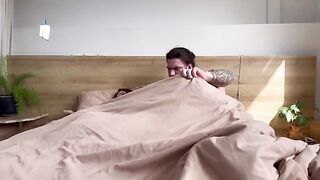 The baby is lying with his stepmom, waiting for a hard dick