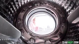 A girl was helped by a guy with vibration from the washing machine