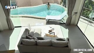 A lonely girl has a vacation in a luxurious swimming pool