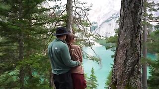A couple making love outdoors in the forest, captured in cinematic HD