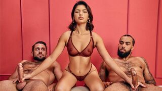 The guys' hands slide along each other, moaning in sync