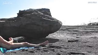 A girl undresses on the beach and masturbates while a guy jerks off