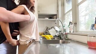 A mature woman with big tits was fucked in the kitchen