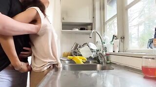 A mature woman with big tits was fucked in the kitchen