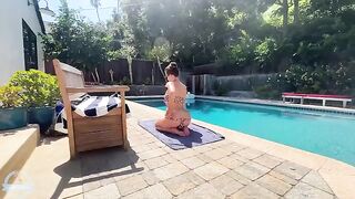 A big-breasted brunette is making splashes in the pool