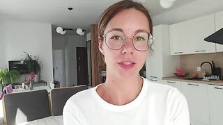 A girl has discharge and plays with it on the sheet