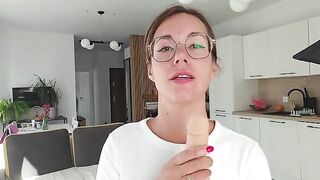 A girl has discharge and plays with it on the sheet
