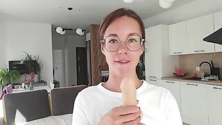 A girl has discharge and plays with it on the sheet