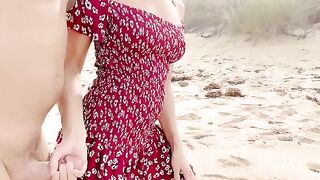A couple has sex on the beach, taking off all their clothes