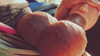 A girl with a silicone mouth works outdoors and brings boys to the point of orgasm