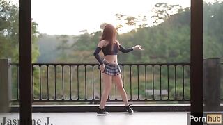 A cute girl, Jasmine J, squirts like a fountain on her balcony with a machine